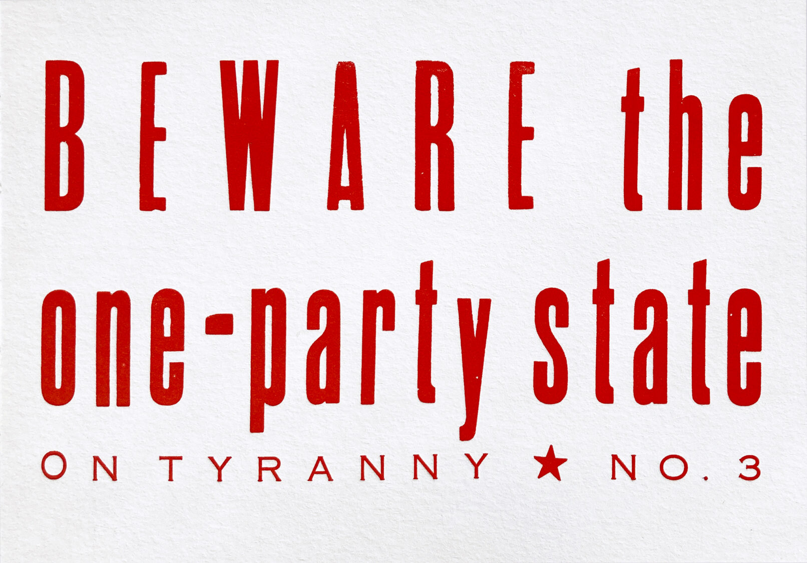 Letterpress print in red ink with text that reads "Beware The One Party State On Tyranny No. 3."